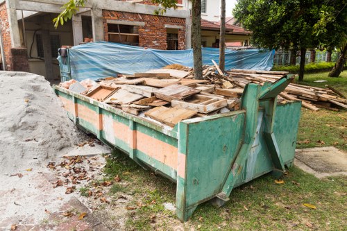 Front view of a commercial waste collection vehicle used in Holborn area