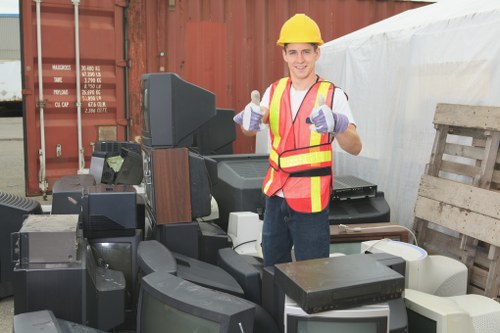 Supervisor conducting an on-site inspection of commercial rubbish collection